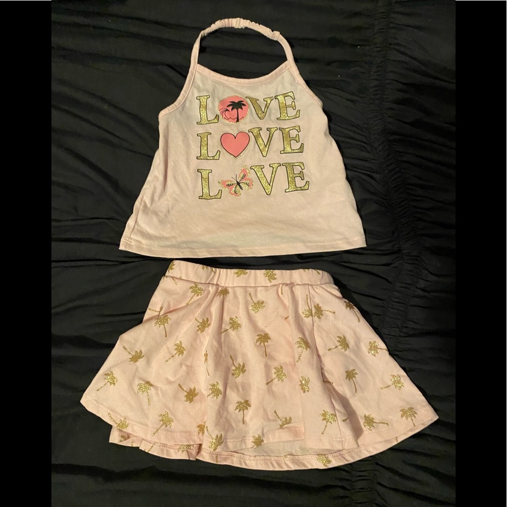 Skirt with shorts under , and matching tank